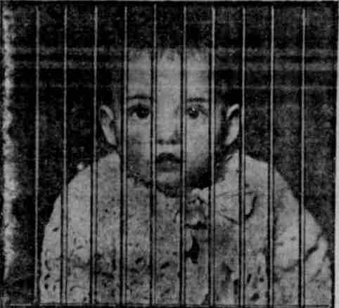 image of Baby Lester behind bars